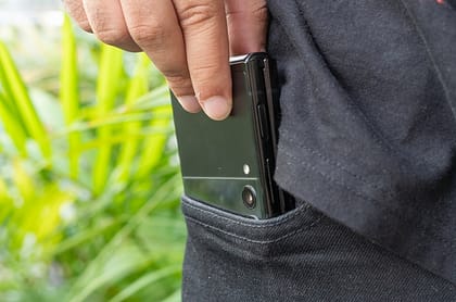 Samsung-Galaxy-Z-Flip-3-slliding-phone-into-pocket